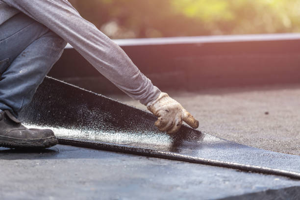Professional Waterproofing technician working in La Crosse, WI